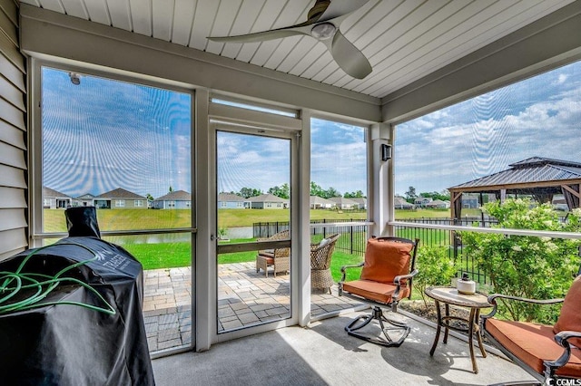 777 Woodland Farms Cir, Aynor, SC 29511 - sunroom with ceiling fan, a water view, and plenty of natural light