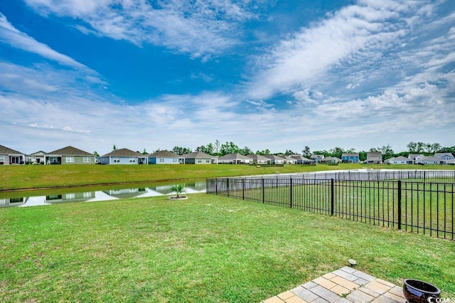 777 Woodland Farms Cir, Aynor, SC 29511 - view of yard featuring a residential view, a water view, and fence
