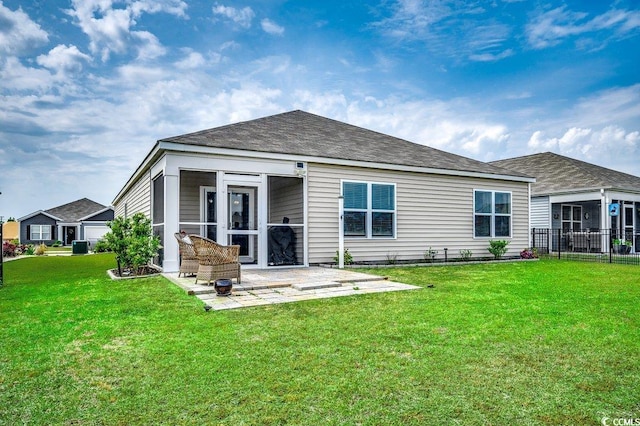 777 Woodland Farms Cir, Aynor, SC 29511 - rear view of house with a patio, a yard, a sunroom, and fence