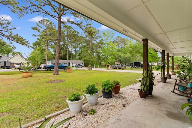 view of yard with a porch