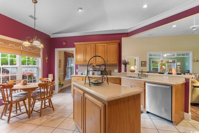 kitchen with a kitchen island with sink, dishwasher, a sink, light tile patterned floors, and light countertops