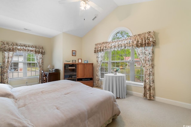 carpeted bedroom featuring visible vents, baseboards, high vaulted ceiling, and multiple windows