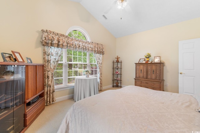 carpeted bedroom with baseboards, a ceiling fan, high vaulted ceiling, and visible vents
