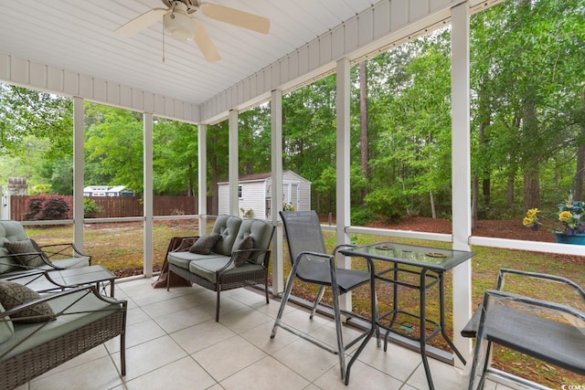 sunroom with ceiling fan and a healthy amount of sunlight