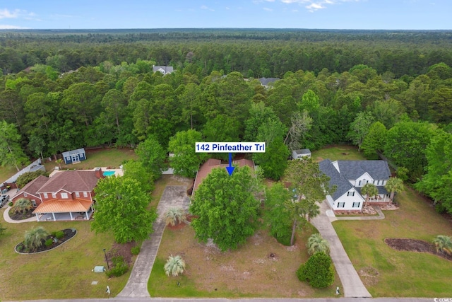 aerial view featuring a forest view