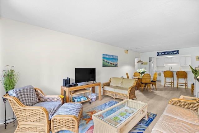 311 71st Ave N Unit 3-D, Myrtle Beach, SC 29572 - living room with light wood-style flooring