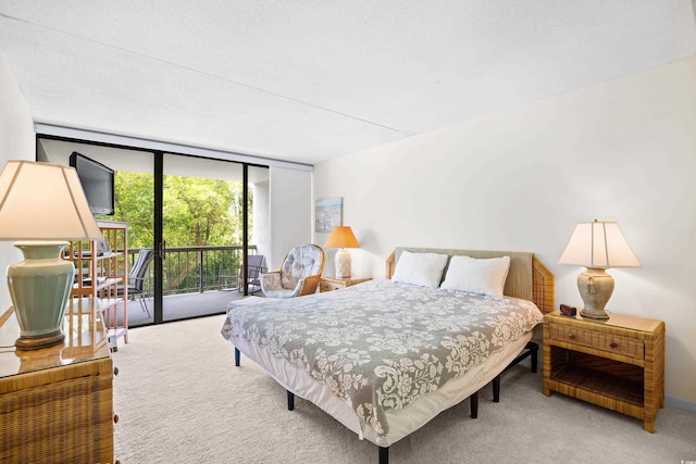 311 71st Ave N Unit 3-D, Myrtle Beach, SC 29572 - carpeted bedroom featuring access to outside and floor to ceiling windows