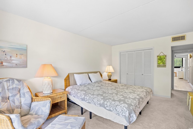 311 71st Ave N Unit 3-D, Myrtle Beach, SC 29572 - carpeted bedroom with baseboards, visible vents, and a closet