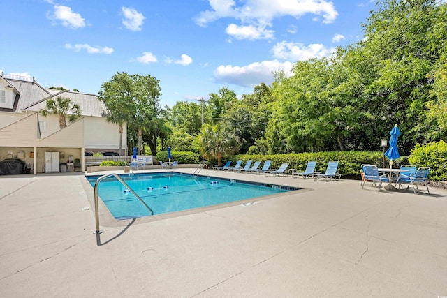 311 71st Ave N Unit 3-D, Myrtle Beach, SC 29572 - community pool with fence and a patio area