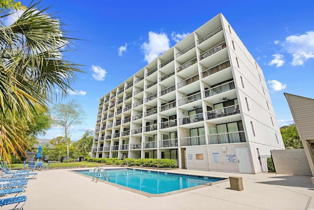 311 71st Ave N Unit 3-D, Myrtle Beach, SC 29572 - pool featuring a patio and a ceiling fan