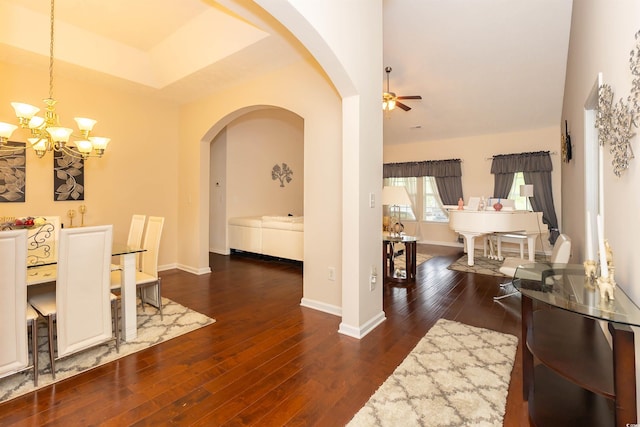 133 Alpharetta Ct, Conway, SC 29526 - dining room with arched walkways, a chandelier, ceiling fan, hardwood / wood-style flooring, and baseboards