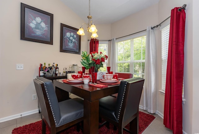 133 Alpharetta Ct, Conway, SC 29526 - tiled dining area with a chandelier, lofted ceiling, and baseboards