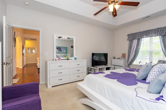 133 Alpharetta Ct, Conway, SC 29526 - bedroom with arched walkways, light colored carpet, and ceiling fan