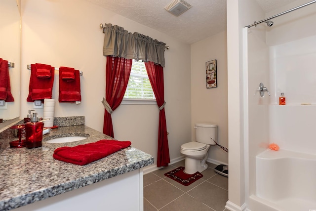 133 Alpharetta Ct, Conway, SC 29526 - bathroom with vanity, a shower stall, toilet, tile patterned floors, and a textured ceiling