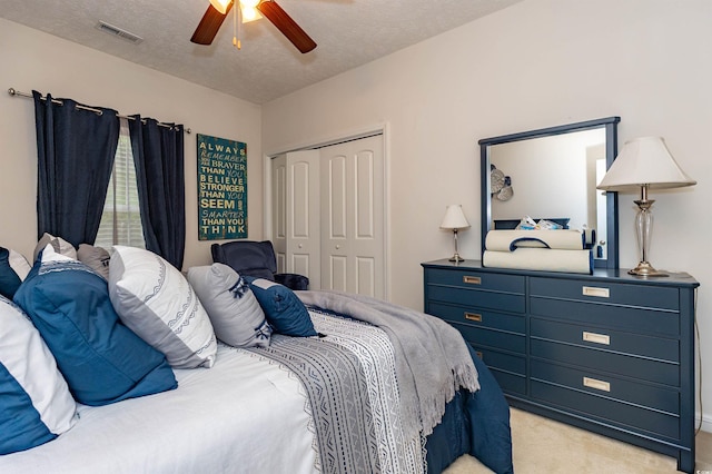 133 Alpharetta Ct, Conway, SC 29526 - bedroom featuring a closet, light carpet, a textured ceiling, and ceiling fan