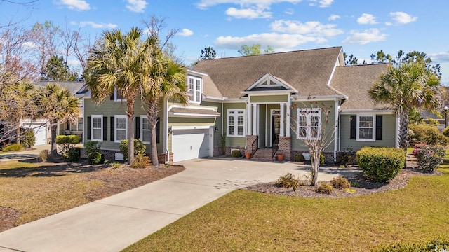 200 Stonefly Ct, Murrells Inlet, SC 29576 - view of front of house featuring an attached garage, a front lawn, roof with shingles, and concrete driveway
