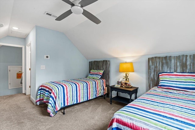 bedroom featuring visible vents, a ceiling fan, carpet flooring, and vaulted ceiling