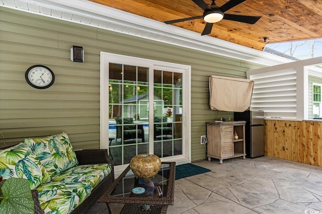 view of patio / terrace featuring ceiling fan