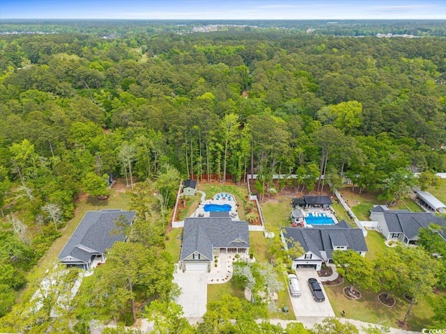 bird's eye view featuring a view of trees
