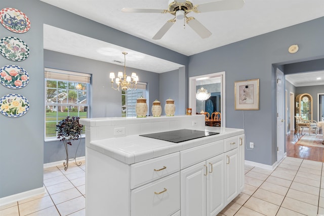 4721 National Dr, Myrtle Beach, SC 29579 - kitchen featuring black electric cooktop, light tile patterned floors, baseboards, and tile counters