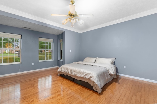 4721 National Dr, Myrtle Beach, SC 29579 - bedroom with baseboards, visible vents, a ceiling fan, and wood finished floors