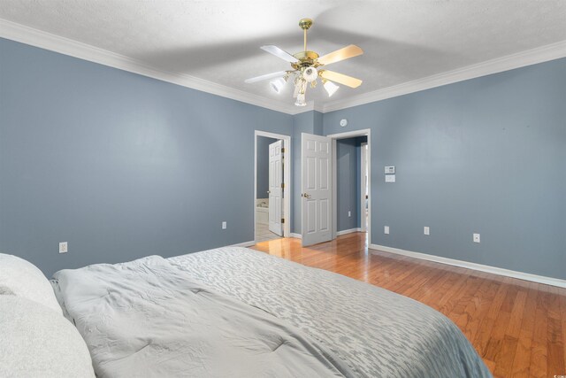 4721 National Dr, Myrtle Beach, SC 29579 - bedroom featuring baseboards, ornamental molding, a ceiling fan, and wood finished floors