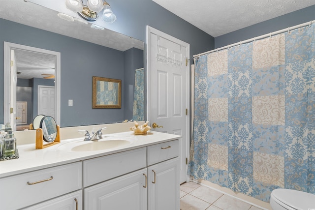 4721 National Dr, Myrtle Beach, SC 29579 - bathroom with tile patterned floors, a textured ceiling, curtained shower, and vanity