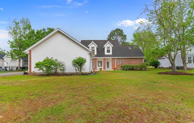 4721 National Dr, Myrtle Beach, SC 29579 - view of front of home with brick siding and a front yard