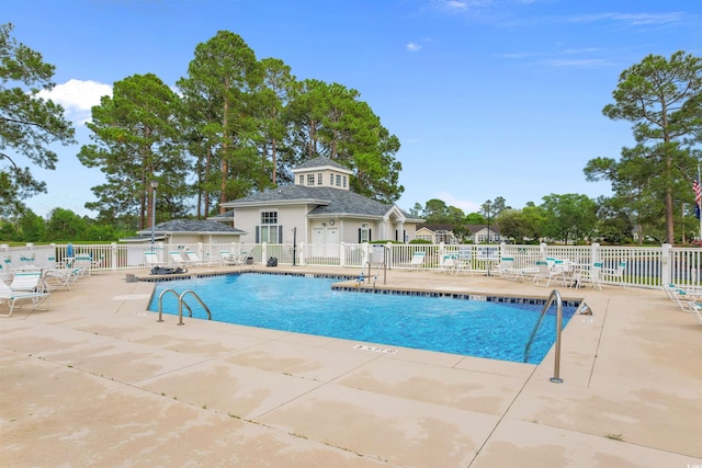 4721 National Dr, Myrtle Beach, SC 29579 - community pool featuring a patio area and fence