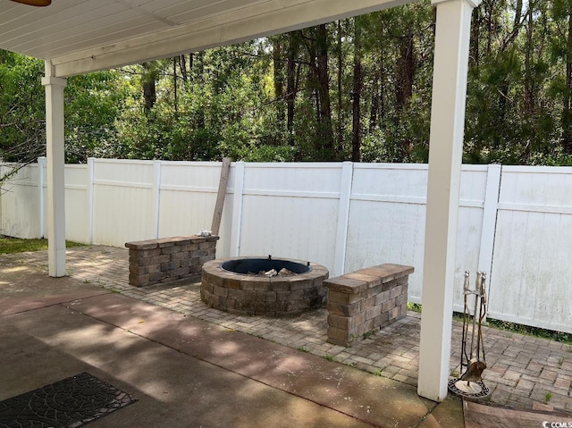 1440 Brighton Ave, Myrtle Beach, SC 29588 - view of patio featuring a fire pit