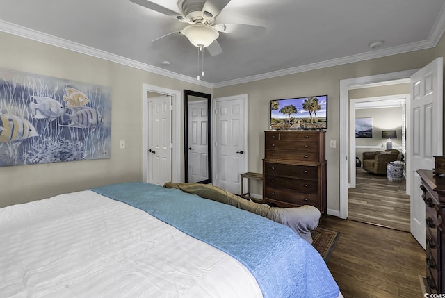 bedroom featuring baseboards, dark wood-style flooring, ornamental molding, and ceiling fan