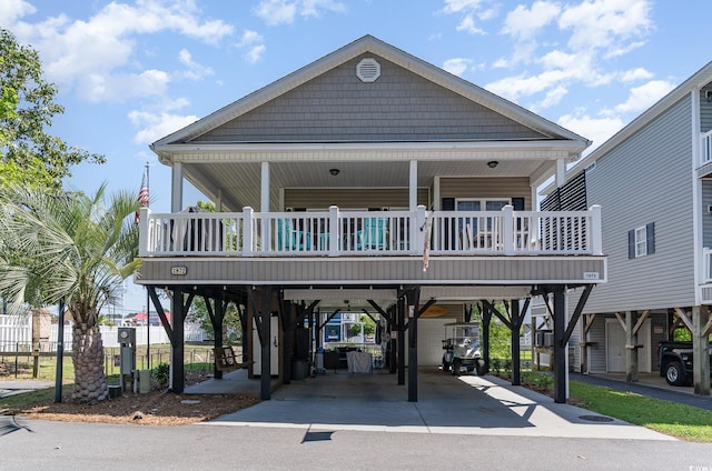 6001-1872 S Kings Hwy, Myrtle Beach, SC 29575 - coastal inspired home featuring a carport and concrete driveway