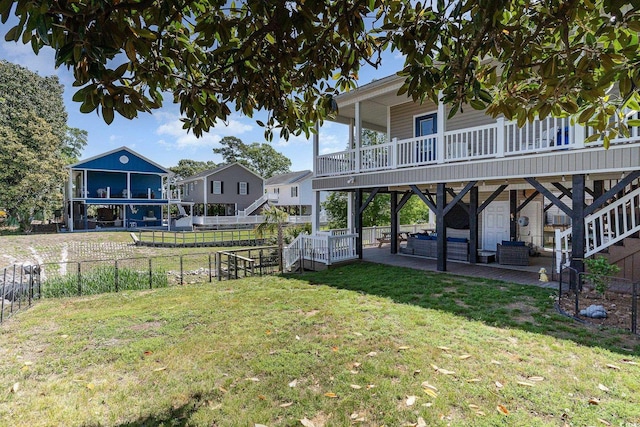 6001-1872 S Kings Hwy, Myrtle Beach, SC 29575 - view of yard with stairway, fence, and a wooden deck