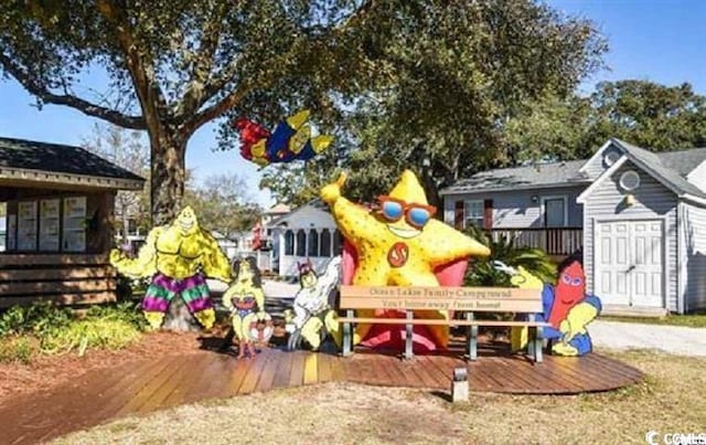 6001-1872 S Kings Hwy, Myrtle Beach, SC 29575 - view of playground featuring an outdoor structure and a shed