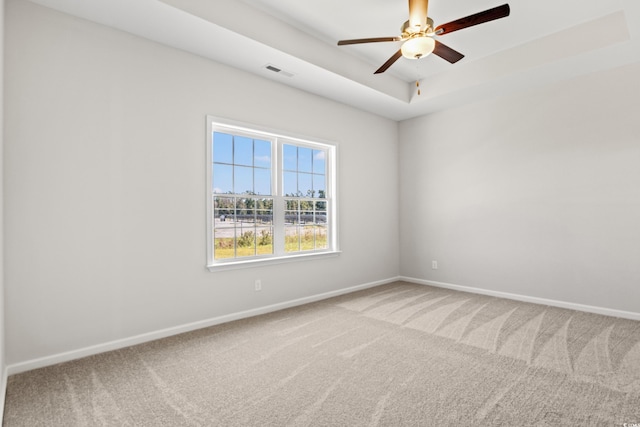 3331 Little Bay Dr, Conway, SC 29526 - empty room featuring carpet floors, a ceiling fan, and a raised ceiling