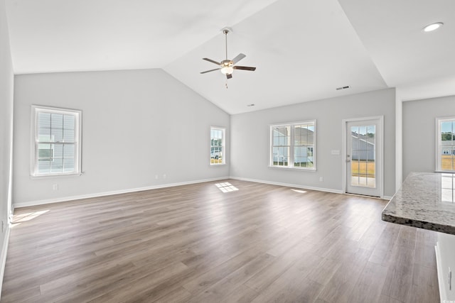 3324 Little Bay Dr, Conway, SC 29526 - unfurnished living room featuring ceiling fan, vaulted ceiling, wood finished floors, baseboards, and recessed lighting
