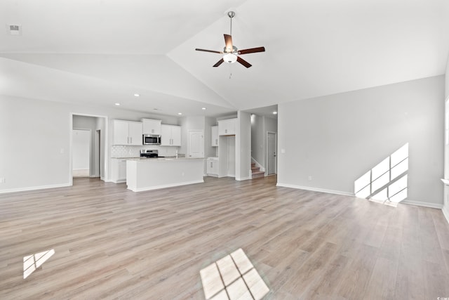 3324 Little Bay Dr, Conway, SC 29526 - unfurnished living room featuring ceiling fan, high vaulted ceiling, light wood finished floors, recessed lighting, and baseboards