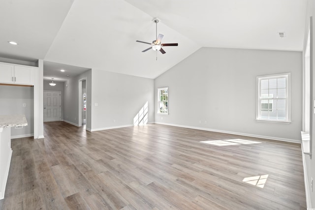 3324 Little Bay Dr, Conway, SC 29526 - unfurnished living room featuring vaulted ceiling, ceiling fan, light wood-style flooring, recessed lighting, and baseboards