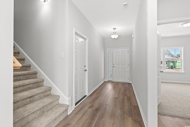 3324 Little Bay Dr, Conway, SC 29526 - foyer entrance with wood finished floors, stairs, and baseboards