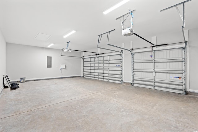 3324 Little Bay Dr, Conway, SC 29526 - garage featuring electric panel, a garage door opener, and baseboards