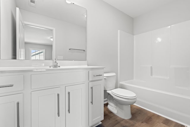 3324 Little Bay Dr, Conway, SC 29526 - bathroom with toilet, wood finished floors, vanity, and shower / bathtub combination