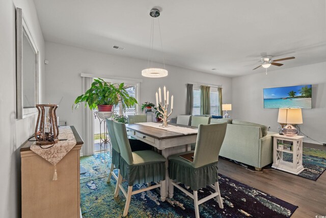 155 Marsh Deer Pl, Surfside Beach, SC 29575 - dining room with wood finished floors, a ceiling fan, and visible vents