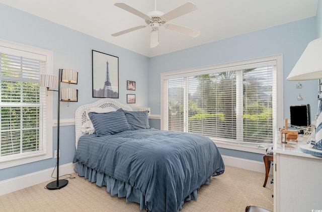 276 Waterfall Cir, Little River, SC 29566 - bedroom with ceiling fan, light colored carpet, and baseboards