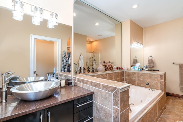 276 Waterfall Cir, Little River, SC 29566 - bathroom featuring recessed lighting, a whirlpool tub, and vanity