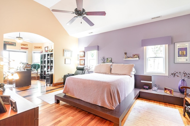 276 Waterfall Cir, Little River, SC 29566 - bedroom with visible vents, high vaulted ceiling, multiple windows, and light wood-style floors