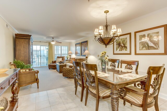 502 48th Ave S Unit 402, North Myrtle Beach, SC 29582 - dining area with crown molding, visible vents, ceiling fan with notable chandelier, and light colored carpet