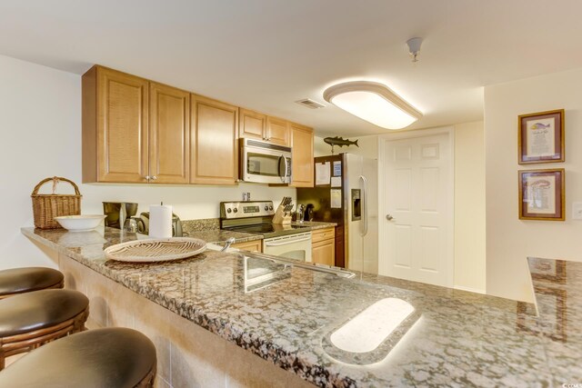 502 48th Ave S Unit 402, North Myrtle Beach, SC 29582 - dining room featuring crown molding, baseboards, ceiling fan with notable chandelier, and light tile patterned flooring