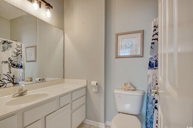 130 Scotch Broom Dr Unit H-103, Little River, SC 29566 - full bathroom featuring baseboards, toilet, tile patterned flooring, and vanity