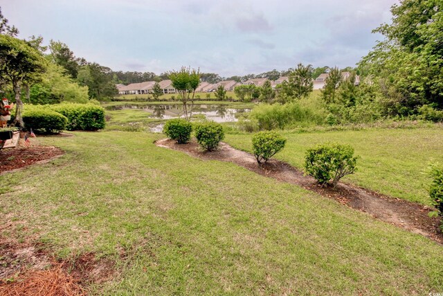 130 Scotch Broom Dr Unit H-103, Little River, SC 29566 - view of yard featuring a water view
