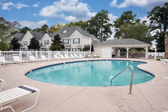130 Scotch Broom Dr Unit H-103, Little River, SC 29566 - community pool with a patio area and fence